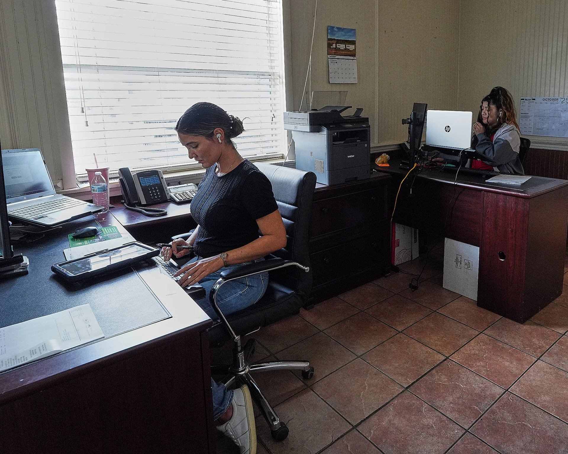 Heavy Duty Tires staff at work in their office